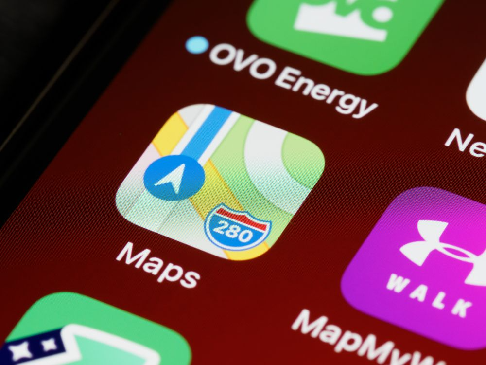 Smartphone maps app illustrating the history of maps and the shift toward standardized navigation.
